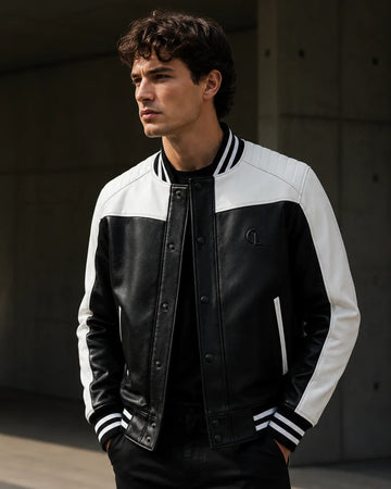 Men's black and white leather varsity jacket with striped ribbed collar and cuffs