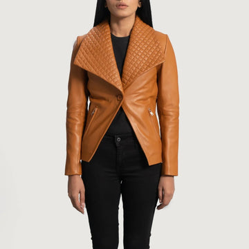 Woman wearing a brown leather blazer with quilted lapels and zip pockets